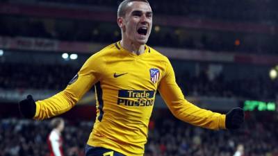 Antoine Griezmann celebrando su gol marcado al Arsenal. Foto AFP