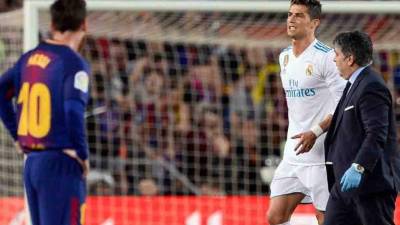 CR7 se lesionó ante Barcelona luego de anotarles. FOTO AFP.