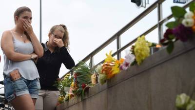 Los alemanes lloran a sus víctimas.