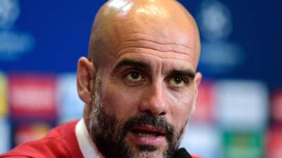 Guardiola durante la conferencia de prensa dada previo al encuentro de este miércoles en el Vicente Calderón. Foto AFP/ Javier Soriano.