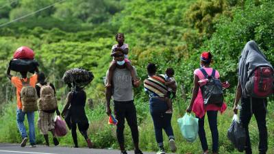 Foto de archivo de haitianos migrantes pasando por Honduras.