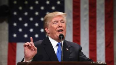 WASHINGTON, DC - JANUARY 30: U.S. President Donald J. Trump delivers the State of the Union address in the chamber of the U.S. House of Representatives January 30, 2018 in Washington, DC. This is the first State of the Union address given by U.S. President Donald Trump and his second joint-session address to Congress. Win McNamee/Getty Images/AFP== FOR NEWSPAPERS, INTERNET, TELCOS & TELEVISION USE ONLY ==
