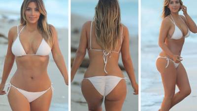Kim Kardashian luce así su nuevo cuerpo en un bikini blanco.