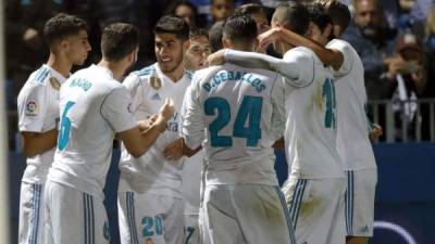 Los jugadores del Real Madrid celebran el primer gol marcado por Marco Asensio ante el Fuenlabrada. Foto EFE