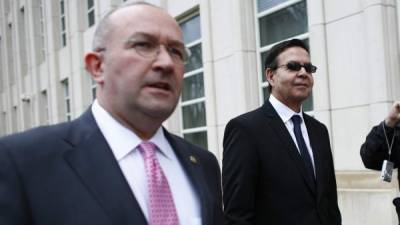 Former Honduran president Rafael Callejas leaves the Brooklyn federal court in New York, March 28, 2016 after pleading guilty to charges of racketeering conspiracy and wire fraud conspiracy in connection with the FIFA corruption scandal. / AFP PHOTO / KENA BETANCUR