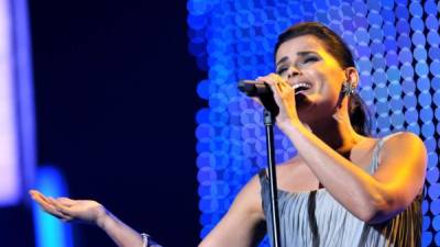 LAS VEGAS, NV - NOVEMBER 14: Singer Nelly Furtado performs onstage during the 2012 Person of the Year honoring Caetano Veloso at the MGM Grand Garden Arena on November 14, 2012 in Las Vegas, Nevada. (Photo by Rodrigo Varela/WireImage)