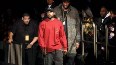 Lamar Odom y Kanye West en un evento de la Semana de la moda.