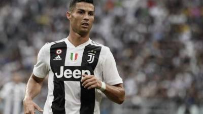 Juventus' Portuguese forward Cristiano Ronaldo reacts during the Italian Serie A football match Juventus vs Lazio on August 25, 2018 at the Allianz Stadium in Turin. / AFP PHOTO / Filippo MONTEFORTE