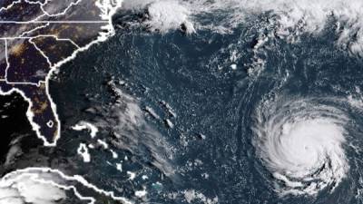 This NOAA/RAMMB satellite image taken at 11:45 UTC on September 10, 2018, shows Hurricane Florence off the US east coast in the Atantic Ocean.Hurricane Florence is expected to become a dangerous 'major hurricane' by late Monday as it heads toward the US East Coast, the National Hurricane Center said, as states of emergency were declared in preparation for the storm. The center of Florence was located about 685 miles (1,100 kilometers) southeast of Bermuda, the NHC in its 0300 GMT Monday advisory.Florence had maximum sustained winds of 90 miles per hour, making it a Category 1 storm on the five-level Saffir-Simpson hurricane scale. / AFP PHOTO / NOAA/RAMMB / HO / RESTRICTED TO EDITORIAL USE - MANDATORY CREDIT 'AFP PHOTO / NOAA/RAMMB' - NO MARKETING NO ADVERTISING CAMPAIGNS - DISTRIBUTED AS A SERVICE TO CLIENTS