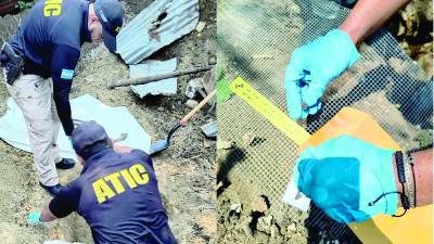 Momento en el que agentes realizan la exhumación de los restos humanos. Hallaron también ropa, un arma blanca y balas.
