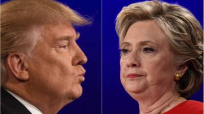 Trump y Clinton se enfrentan en una de las elecciones más reñidas y decisivas de la historia. AFP.