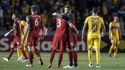 Jugadores de Toronto de Canadá festejan la clasificación a las semifinales de la Concachampions. Foto EFE