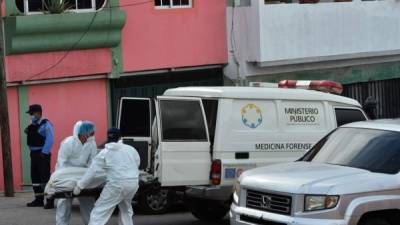 Dos mujeres fueron asesinadas el domingo en la colonia La Rosa de Tegucigalpa. Foto: AFP