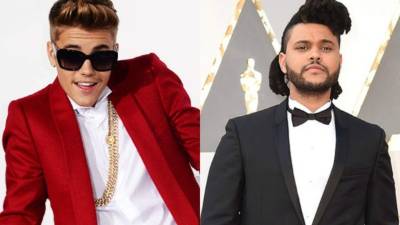 Los cantantes canadienses Justin Bieber y The Weeknd.