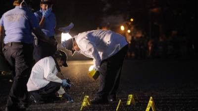 Equipos de la Dirección Policial de Investigaciones (DPI) trabajan en los casos de masacres.