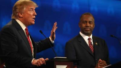 Trump y Carson encabezan las encuestas de intención de voto de los republicanos.