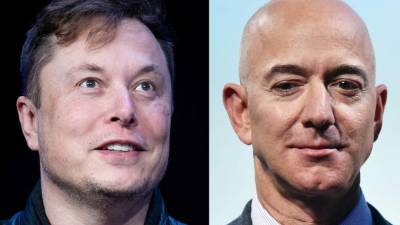 Elon Musk, propietario de SpaceX, y Jeff Bezos, fundador de Blue Origin. Fotos: EFE