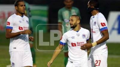 Los goleadores del partido, Ezequiel Aguirre, Jerry Bengtson y Eddie Hernández, contra el Real de Minas. Foto Axel Pérez