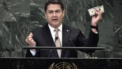 Honduran President Juan Orlando Hernández Alvarado addresses the General Debate of the 73rd session of the General Assembly at the United Nations in New York September 26, 2018. / AFP PHOTO / Angela Weiss