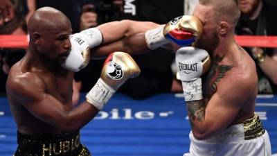 Floyd Mayweather se embolsará una jugosa suma de dinero por la pelea contra Conor McGregor. Foto AFP