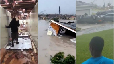 CORRECTS FROM CANAL TO ROAD - A road is flooded during the passing of Hurricane Dorian in Freeport, Grand Bahama, Bahamas, Monday, Sept. 2, 2019. Hurricane Dorian hovered over the Bahamas on Monday, pummeling the islands with a fearsome Category 4 assault that forced even rescue crews to take shelter until the onslaught passes. (AP Photo/Tim Aylen)