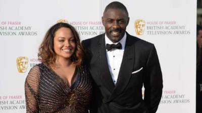 Naiyana Garth e Idris Elba.
