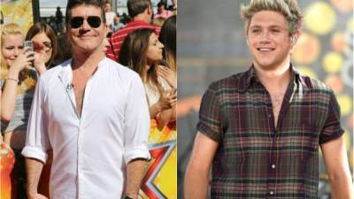 Simon Cowell y el cantante Niall Horan