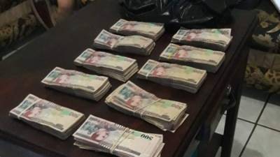 El dinero decomisado por la Policía a la banda delictiva que operaba en Copán.