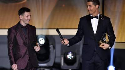 Cristiano Ronaldo junto a Lionel Messi en la Gala del Balón de Oro 2014 que ganó el portugués.