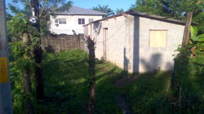 En el interior de esta vivienda fue asesinado Luis Rodolfo Orellana en La Masica.