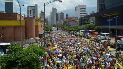 Los manifestantes se aglutinaron en vías y plazas de las principales ciudades del país y también del exterior, como en Nueva York y Miami. AFP.