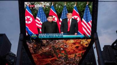 El presidente estadounidense Donald Trump y el dirigente norcoreano Kim Jong-un en Singapur. AFP