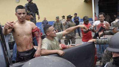 El centro penal ceibeño fue escenario de una cruenta batalla entre reclusos y militares después que los ocupantes del presidio se vieran descubiertos con objetos prohibidos.