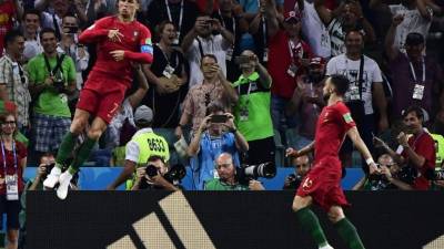 CR7 celebró por todo lo alto su penal anotado. FOTO AFP-PIERRE-PHILIPPE MARCOU .