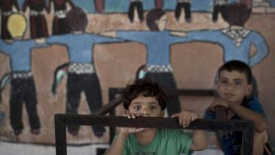 Un niño palestino, refugiado en una de las escuelas de la ONU en Gaza.