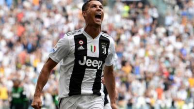 Cristiano Ronaldo celebrando su primer gol con la Juventus en la Serie A de Italia. Foto AFP