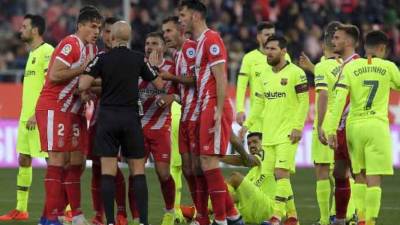 Te presentamos las imágenes más curiosas de la victoria del Barcelona de 0-2 ante Girona. El delantero hondureño Antony Lozano ingresó en el minuto 80. FOTOS AFP Y GIRONA FC.