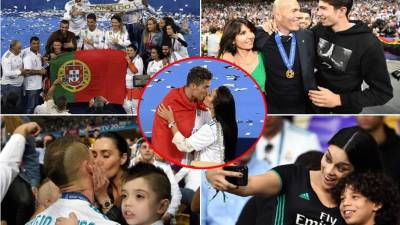 Los jugadores del Real Madrid y su entrenador Zinedine Zidane celebraron sobre el césped del estadio Olímpico de Kiev con sus familiares y amigos tras ganar la Champions League ante Liverpool. Fotos AFP