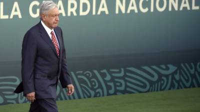 Mexican president Andres Manuel Lopez Obrador walks during the ceremony of deployment of Mexico's new National Guard force at the Campo Marte in Mexico City on June 30, 2019. - Obrador announced on June 27 that his government will deploy the newly created National Guard in Mexico City, after an increase of homicides in the capital. (Photo by ALFREDO ESTRELLA / AFP)