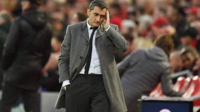 Barcelona's Spanish coach Ernesto Valverde looks on during the UEFA Champions league semi-final second leg football match between Liverpool and Barcelona at Anfield in Liverpool, north west England on May 7, 2019. (Photo by Oli SCARFF / AFP)