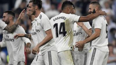 Los jugadores del Real Madrid celebrando uno de los goles de Karim Benzema contra el Leganés. Foto AFP