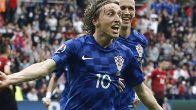 Modric celebrando a lo grande su hermoso tanto. Foto EFE.