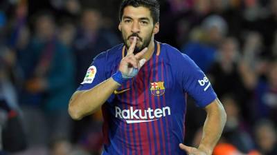 Luis Suárez celebrando su gol contra el Valencia en el Camp Nou. Foto AFP