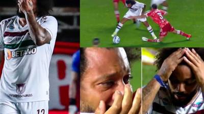 El experimentado futbolista brasileño Marcelo no pudo evitar las lágrimas tras provocarle una impactante lesión al jugador argentino Luciano Sánchez.