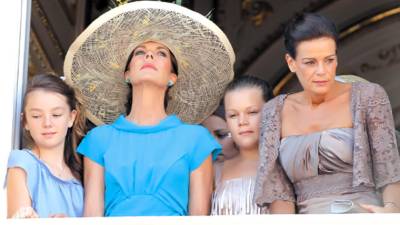 from left : The daughter of Princess Caroline of Hanover, Princess Alexandra of Hanover, Princess Caroline of Hanover, the daughter of Princess Stephanie of Monaco Camille Marie Kelly Gottlieb and Princess Stephanie of Monaco pose on the balcony after the civil wedding of Prince Albert II of Monaco and South African Charlene Wittstock at the Prince's Palace on July 1, 2011 in Monaco. AFP PHOTO / VALERY HACHE
