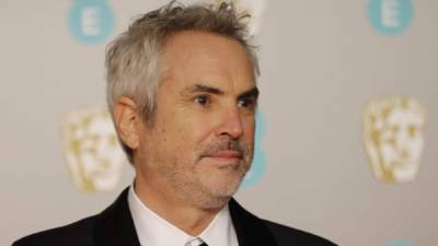 Alfonso Cuarón en los BAFTA este 10 de febrero. Foto Tolga AKMEN / AFP.