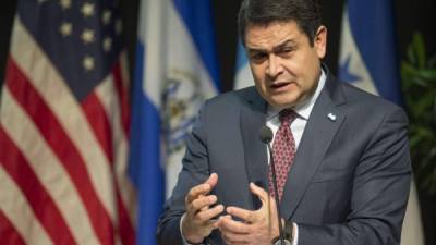 El presidente de Honduras, Juan Orlando Hernández asiste a un seminario sobre 'La inversión en América Central' en el Banco Interamericano de Desarrollo en Washington, DC, 14 de noviembre de 2014. AFP