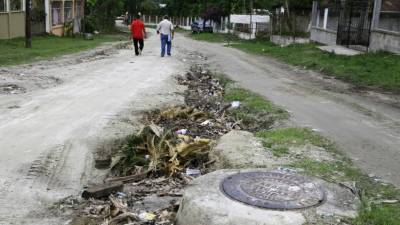 Esta es la calle principal de la comunidad El Zapotal y está deteriorada. Foto: Jorge Gonzales.