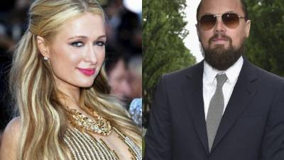 La socialité Paris Hilton y el actor Leonardo DiCaprio.