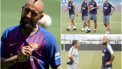 El chileno Arturo Vidal, nuevo jugador de FC Barcelona, se ha entrenado este lunes por primera vez con sus nuevos compañeros en la Ciudad Deportiva, donde ha podido conocer a Lionel Messi y Luis Suárez, entre otros internacionales. Mira las imágenes más curiosas de lo que fue su recimiento. FOTOS FC BARCELONA.COM.